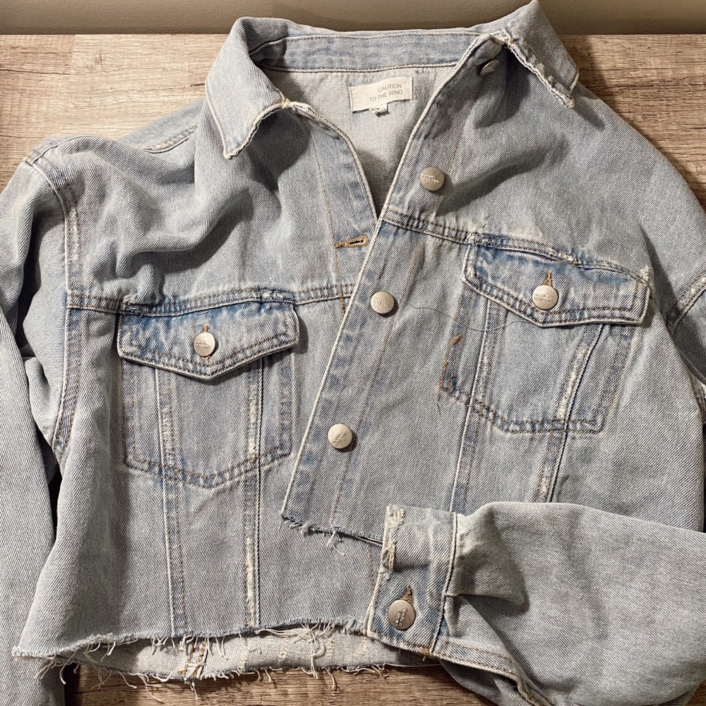 light washed cropped distressed jean jacket